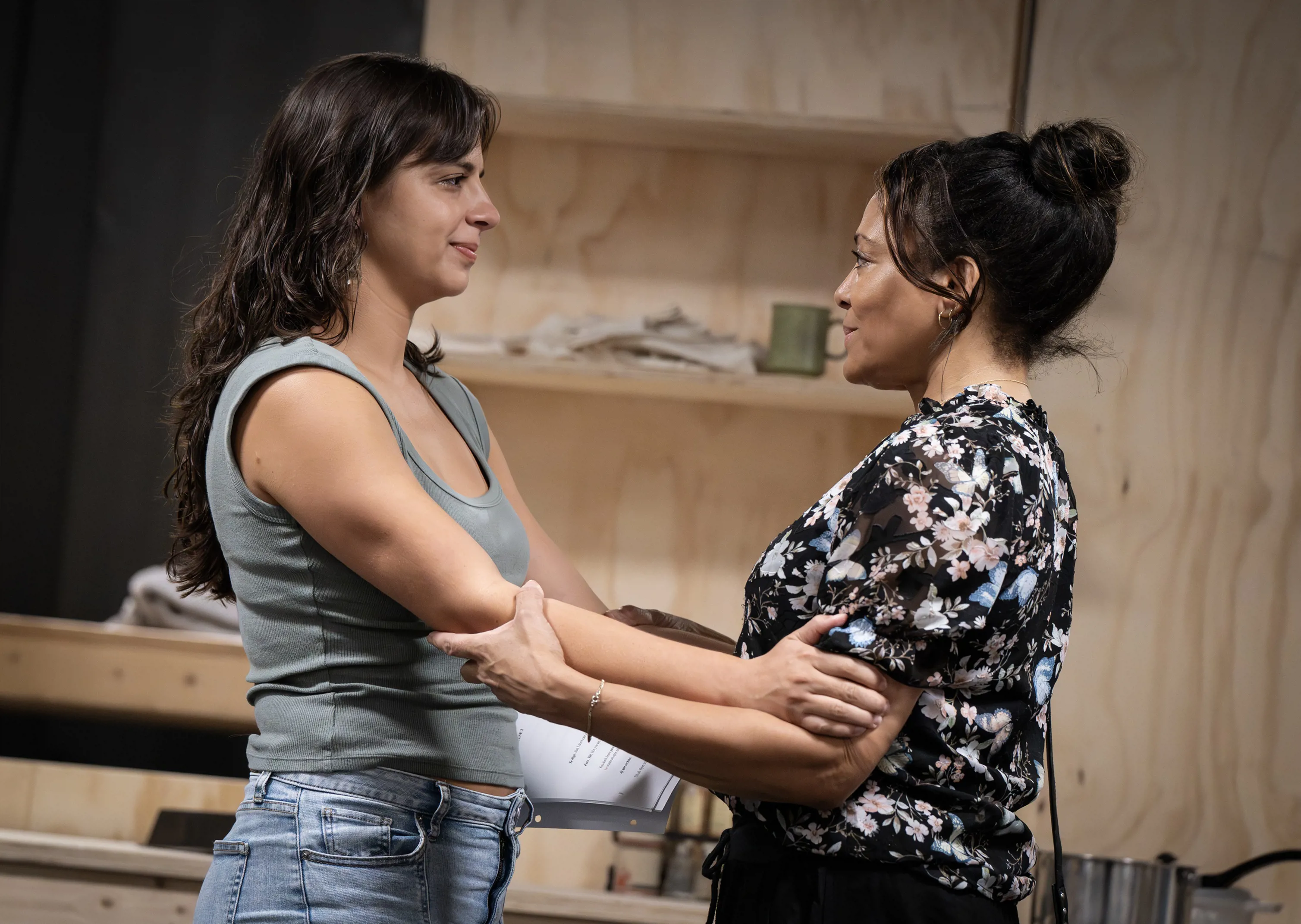Rebecca Jimenez and Luna Lauren Velez in rehearsal for THE OTHER AMERICANS, written by John Leguizamo and directed by Ruben Santiago-Hudson, at The Public Theater. Photo credit: Joan Marcus.