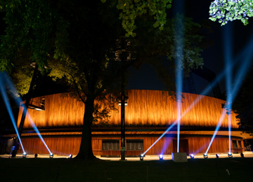 Lights on The Delacorte Theater facade at night