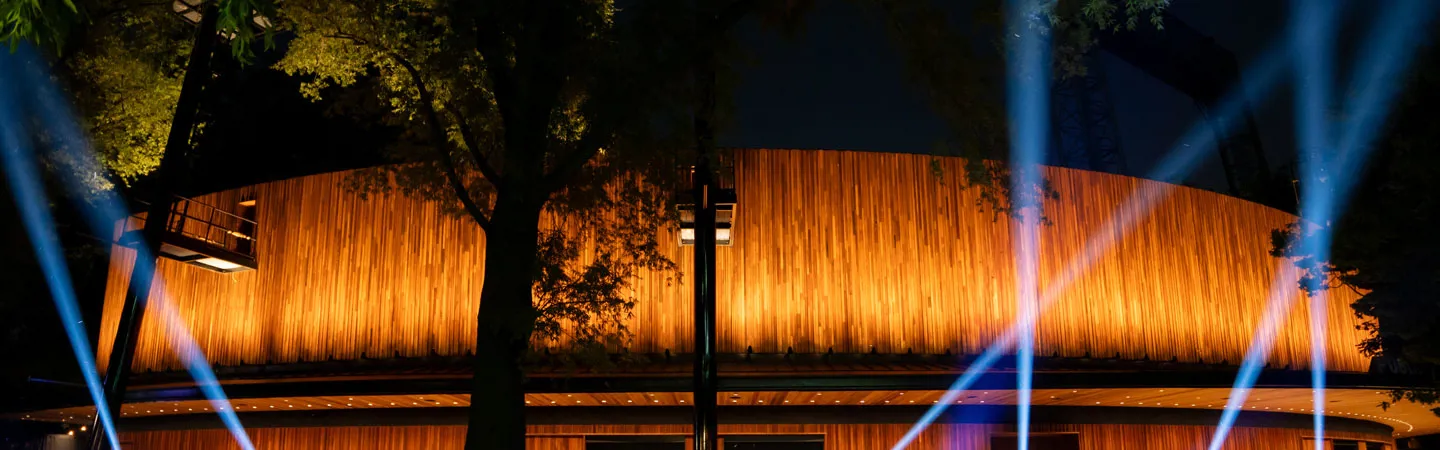 Lights on The Delacorte Theater facade at night